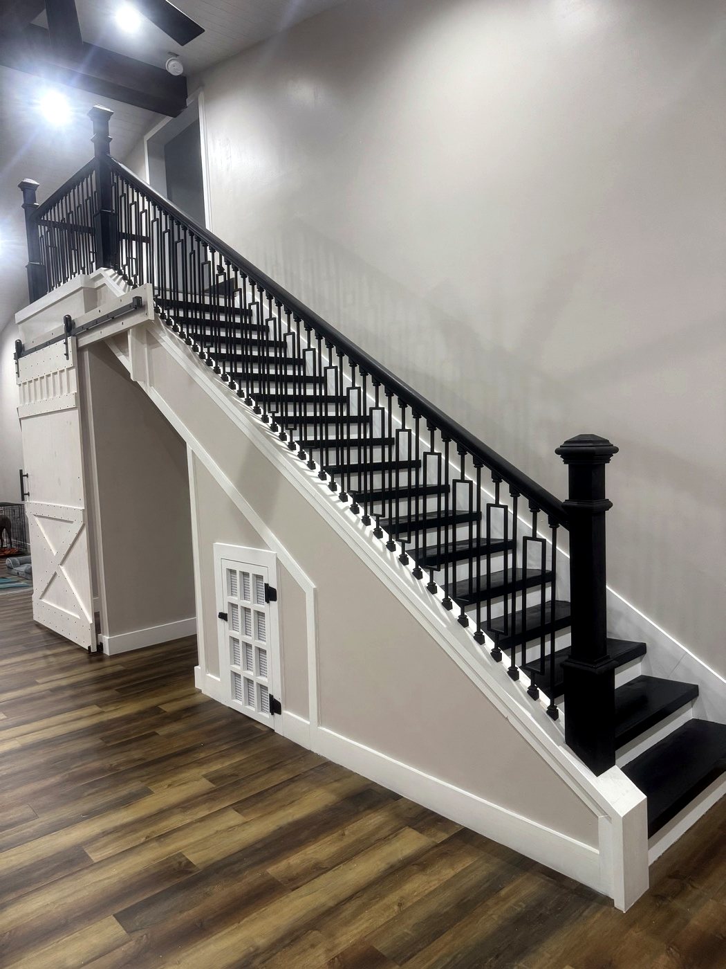 Custom staircase with iron balusters